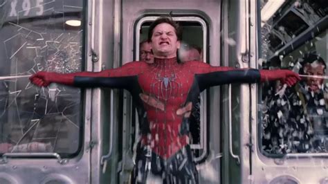 spiderman holding train meme|carefully he's a hero gif.